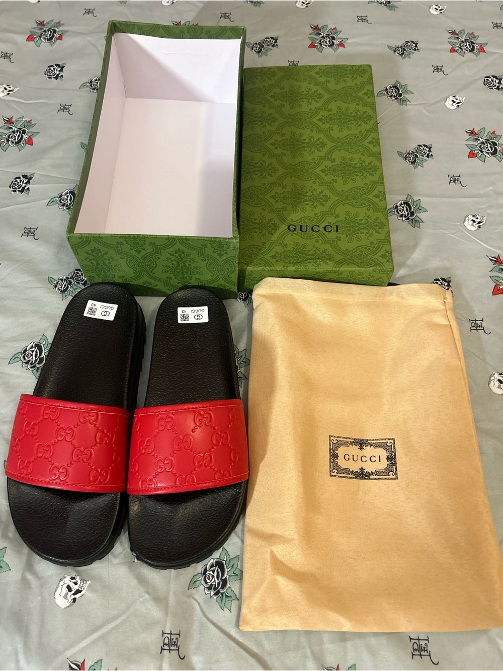 Gucci Men’s Black Footbed Red Embossed Logo Slide Sandals